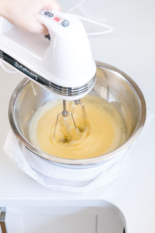 Off the heat, hand mixer whipping egg/sugar mixture.
