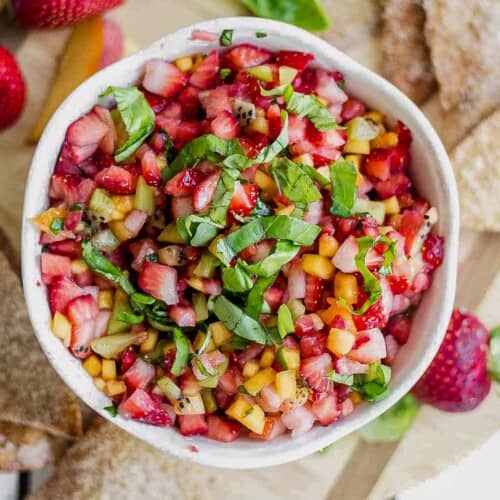 fruit salsa in a serving bowl and cinnamon chips on the side